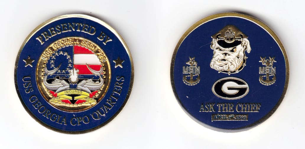 Round shaped coin,brass in color, 1 47/64 inches in diameter.