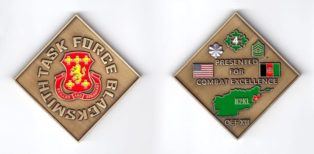 Square shaped coin with angle down, antique brass in color, 2 3/4 inches high x 2 3/4 inches wide.