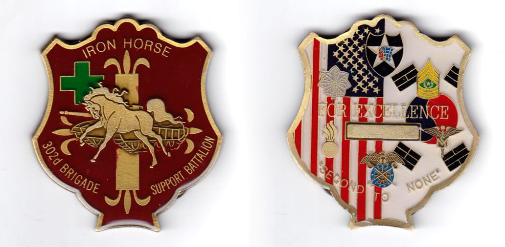 Renaissance-era shield shaped coin,antique brass in color, 2 1/2 inches high x 2 1/4 inches wide.