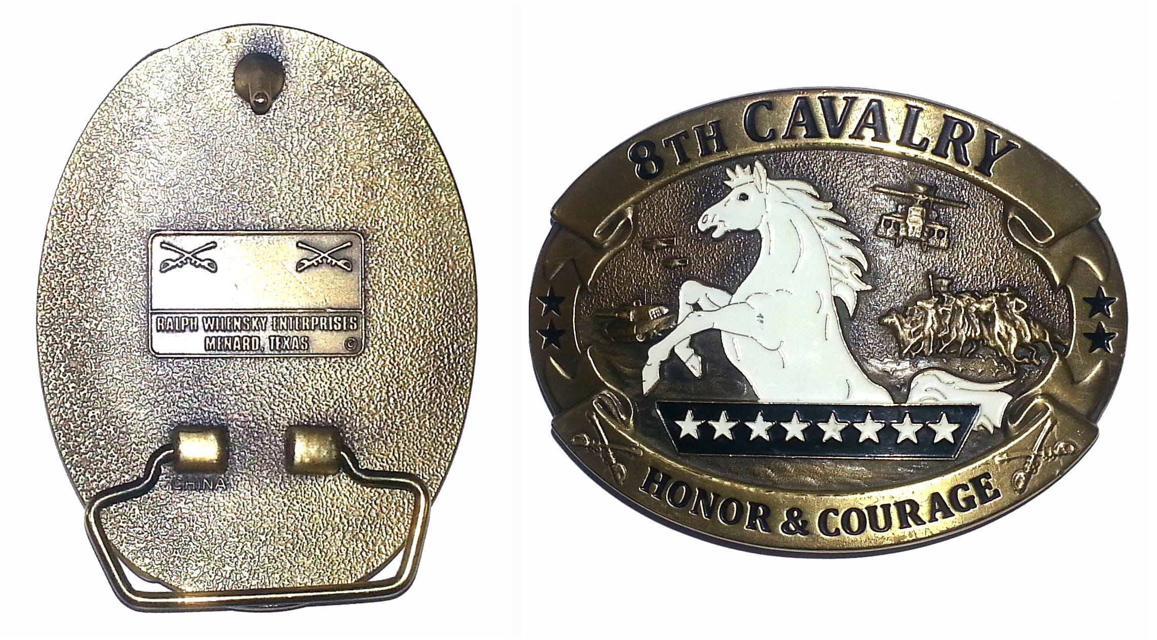 Oval shaped belt buckle, antique brass in color, 2 5/8 inches high x 3 1/2 inches wide.