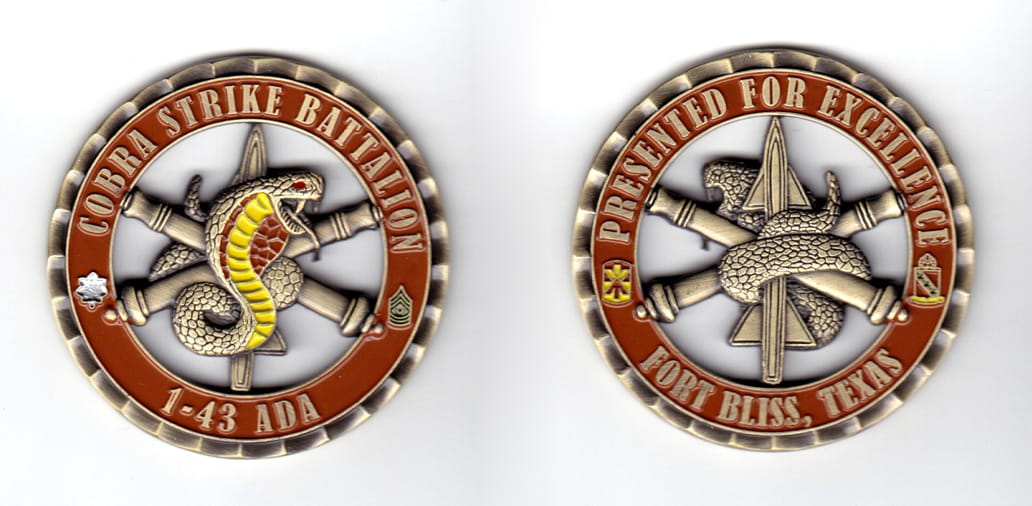 Round shaped coin, brass in color, 2 1/4 inches in diameter.