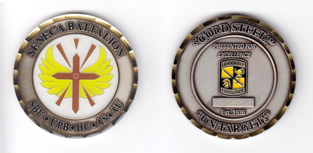 Round shaped coinl, antique brass in color, 2 1/2 inches in diameter.