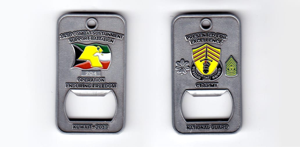 Rectangular coin with bottle opener cutout, pewter in color, 2 1/4 inches high x 1 1/4 inches wide.