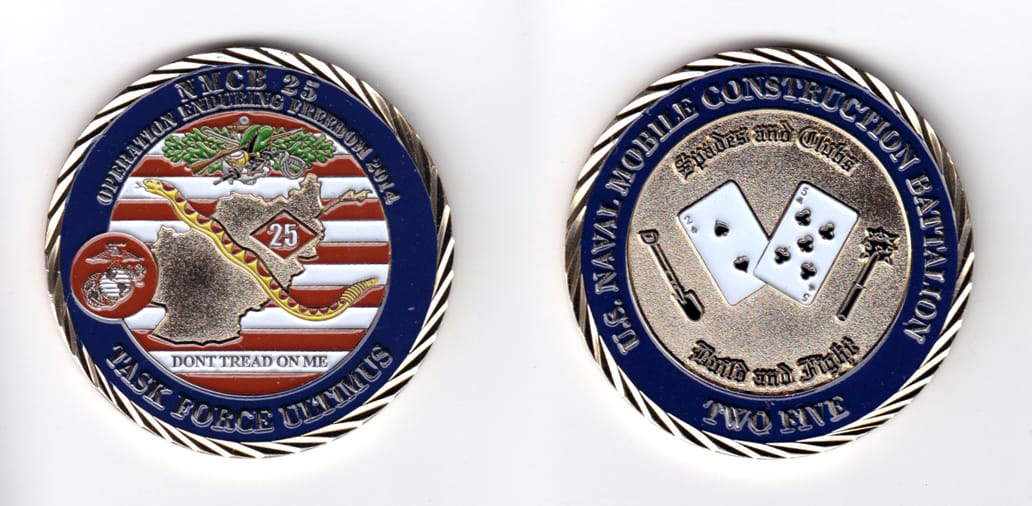 Round shaped coin, brass in color, 2 inches in diameter.