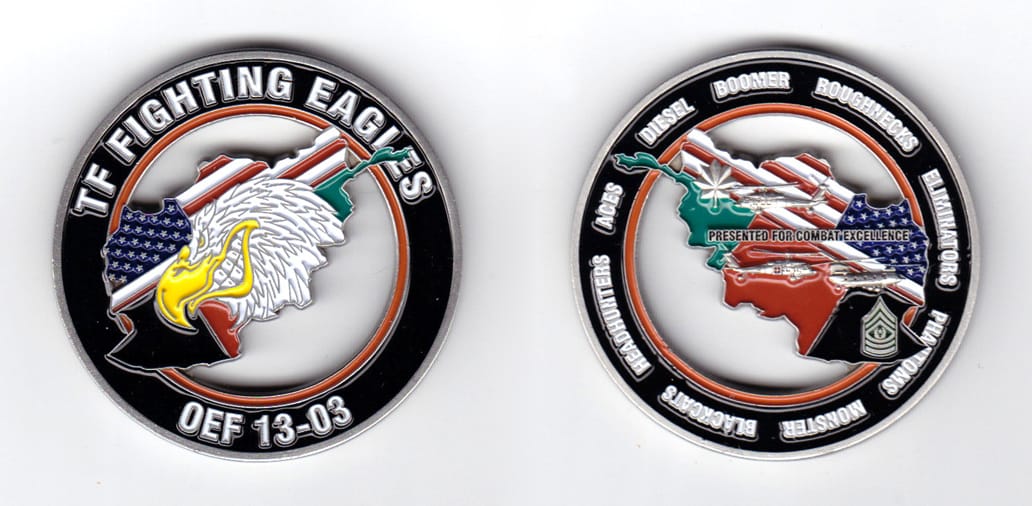 Round shaped coin, pewter in color, 2 inches in diameter.