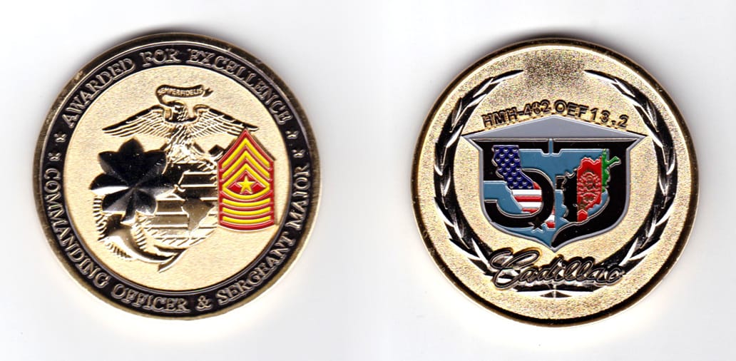 Round shaped coin, brass in color, 2 inches in diameter.