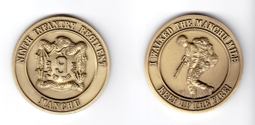 Round shaped coin, antique brass in color, 2 inches in diameter.