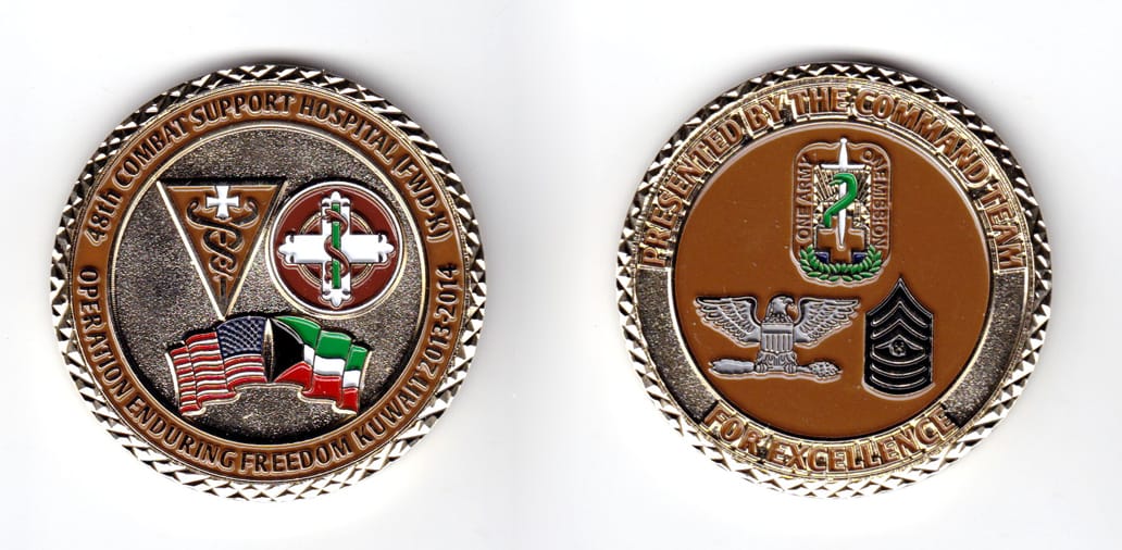 Round shaped coin, brass in color, 2 inches in diameter.