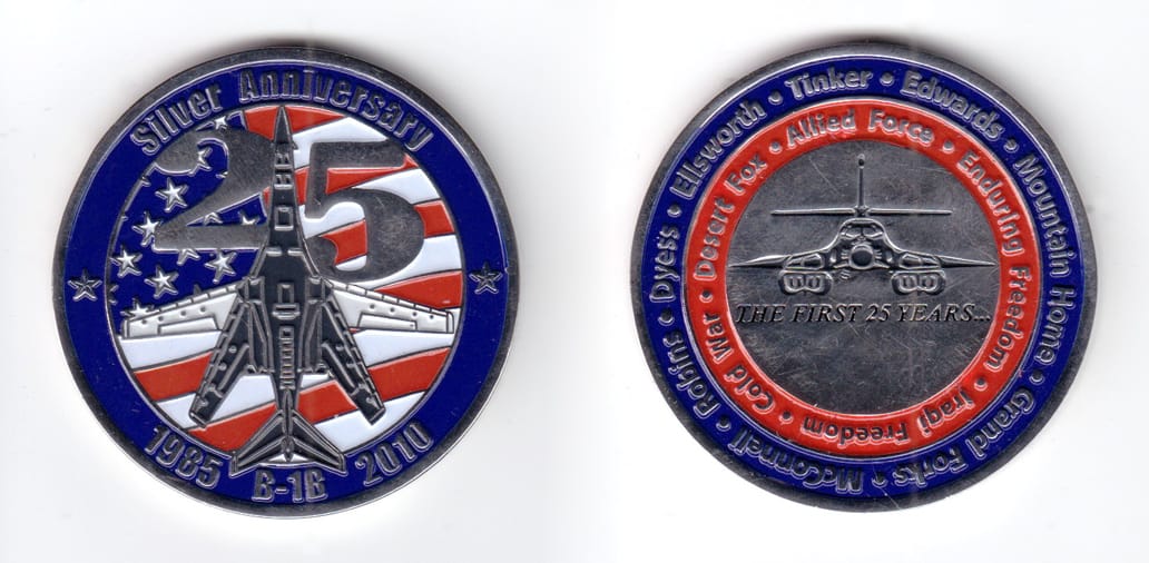 Round shaped coin, silver in color, 2 inches in diameter.