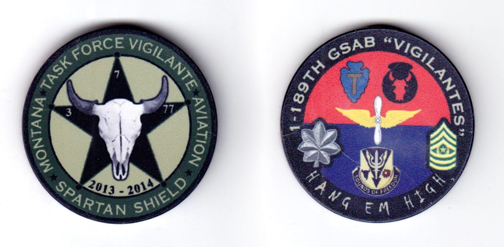 Round shaped poker chip, black and gray in color, 1 3/4 inches in diameter.