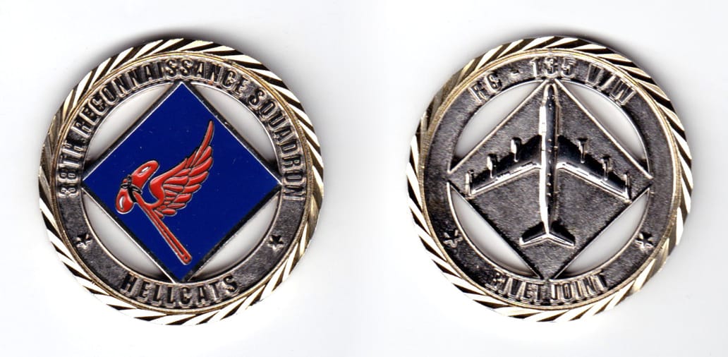 Round shaped coin, brass in color, 1 3/4 inches in diameter.