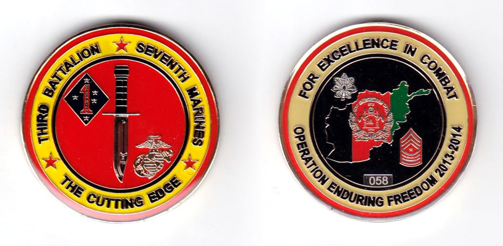 Round shaped coin, brass in color, 1 3/4 inches in diameter.