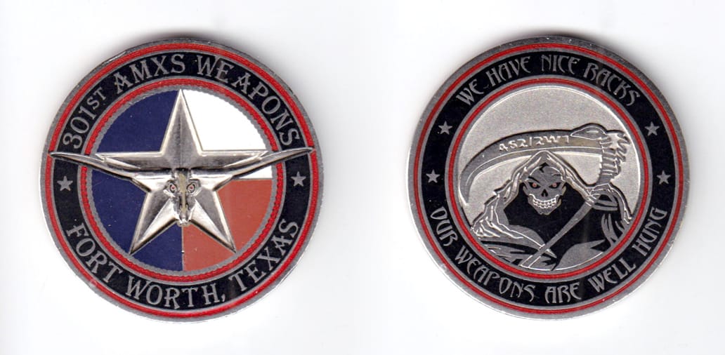 Round shaped coin, pewter in color, 1 3/4 inches in diameter.