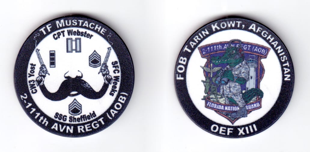 Round shaped poker chip, black in color, 1 3/4 inches in diameter.