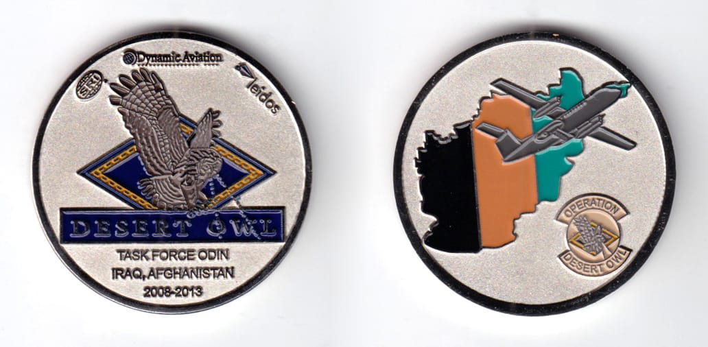 Round shaped coin,pewter in color, 1 3/4 inches in diameter.