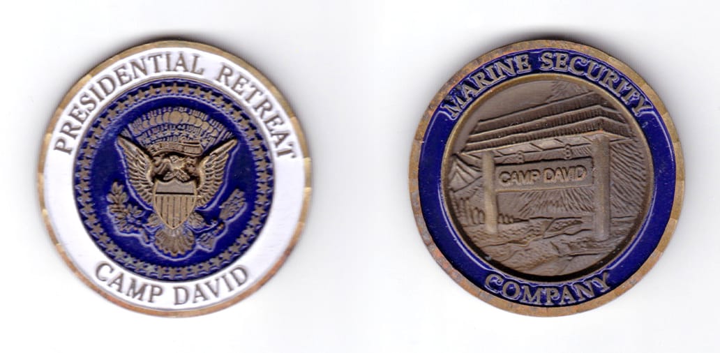 Round shaped coin, antique brass in color, 1 3/4 inches in diameter.