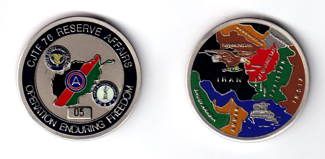 Round shaped coin, pewter in color, 1 5/8 inche in diameter.