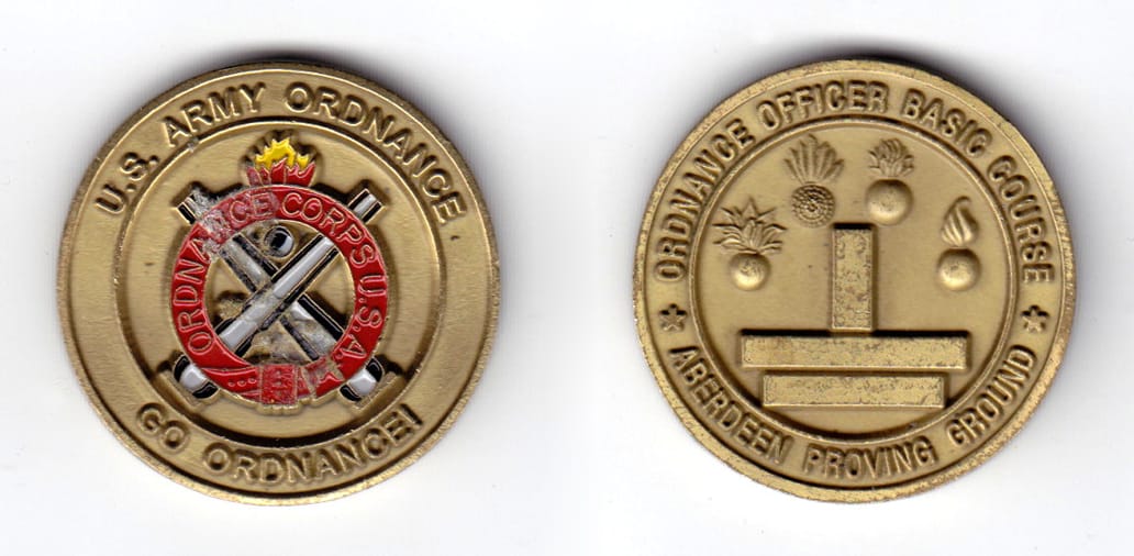 Round shaped coin, antique brass in color, 1 1/2 inches in diameter.