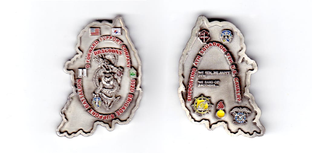 Sough Korea shaped coin, pewter in color, 1 3/4 inches high x 1 1/3 inches wide.