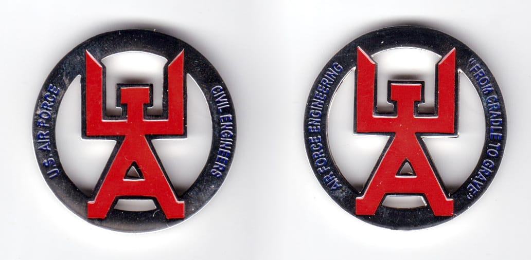 Round shaped coin, silver in color, 1 1/2 inches in diameter.