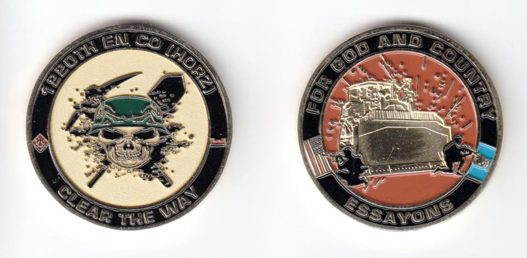 Round shaped coin, brass in color, 1 1/2 inches in diameter.