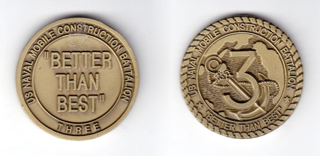 Round shaped coin, antique brass in color, 1 1/2 inches in diameter.