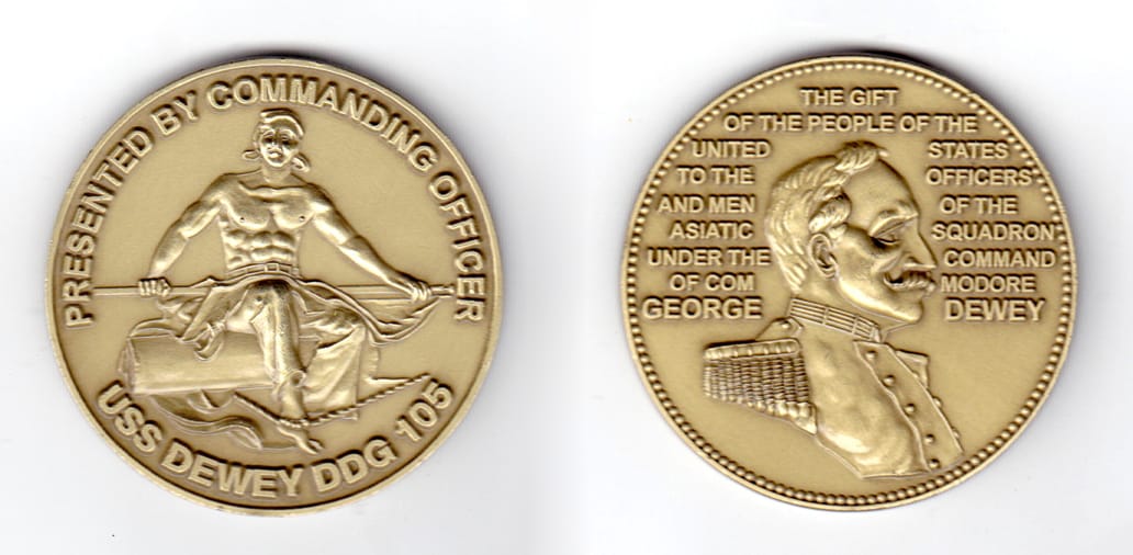 Round shaped coin, antique brass in color, 2 inches in diameter.