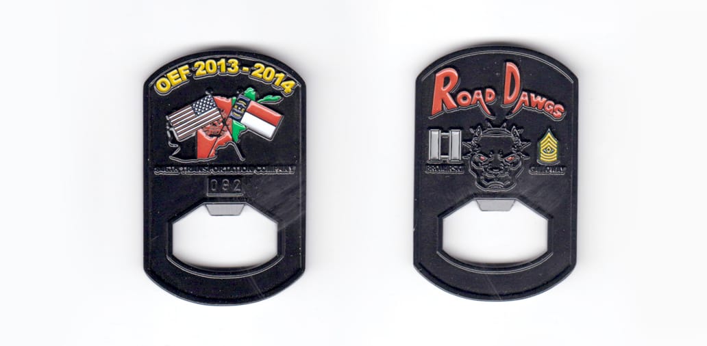 Rectangular shaped bottle opener on end with rounded short sides, black in color, 2 1/4 inches high x 1 1/2 inches wide.