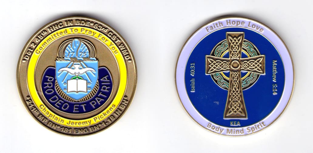 Round shaped coin, antique brass in color, 2 inches in diameter.