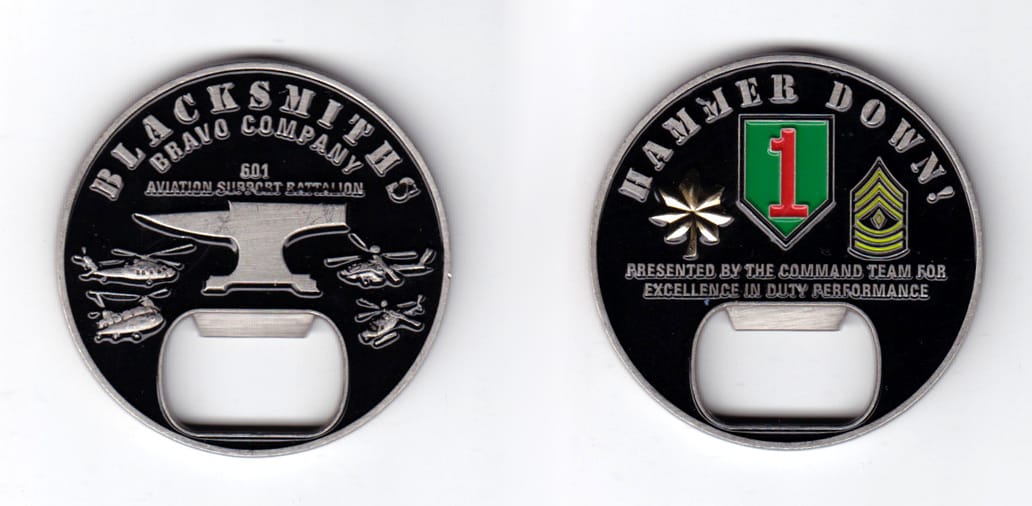 Round shaped coin, pewter in color, 2 inches in diameter.