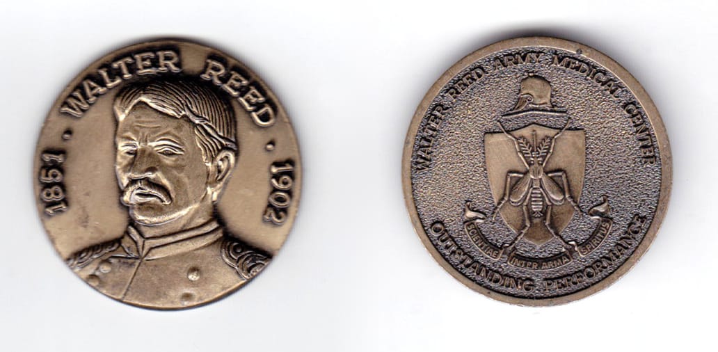 Round shaped coin, antique brass in color, 1 1/2 inches in diameter.