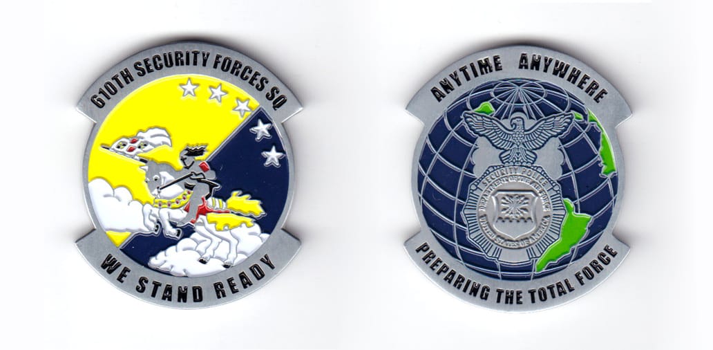 Round shaped coin with banners at the top and bottom following the outline of the coin, pewter in color, 1 3/4 inches hi...