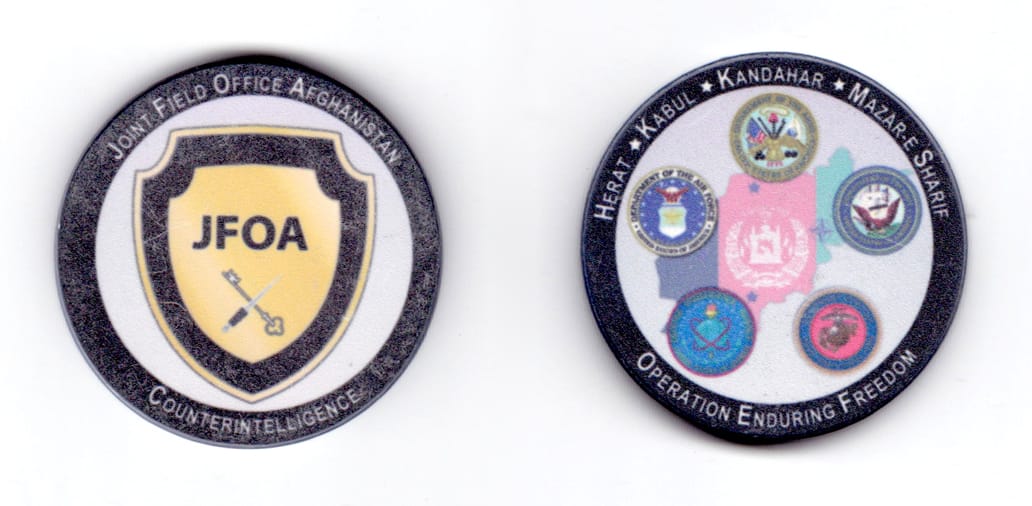 Round shaped poker chip, gray and white in color, 1 3/4 inches in diameter.