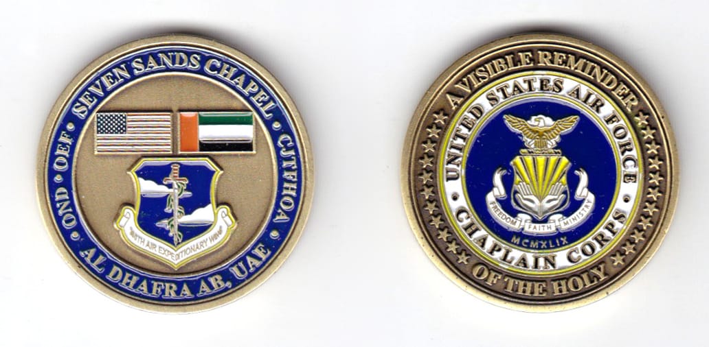 Round shaped coin, pewter in color, 1 5/8 inches in diameter.