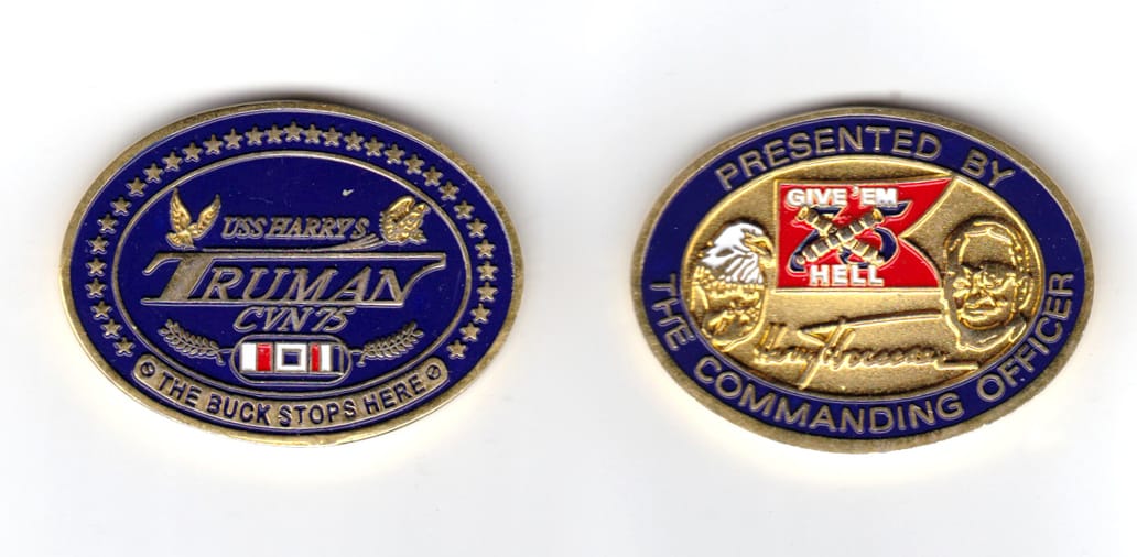 Oval shaped coin, brass in color, 1 1/2 inches high x 2 inches wide.