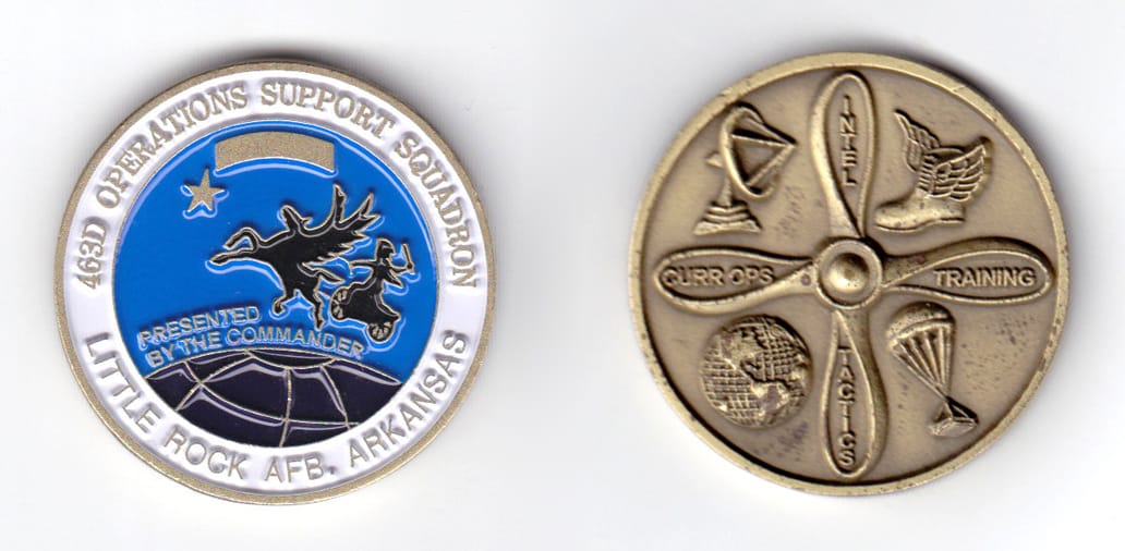 Round shaped coin, antique brass in color, 1 5/8 inches in diameter.