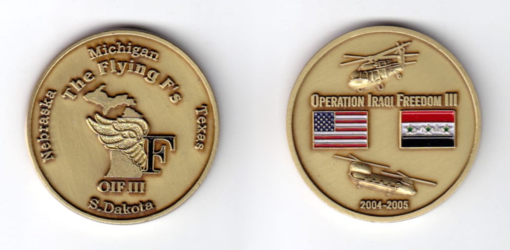 Round shaped coin, antique brass in color, 1 1/2 inches in diameter.