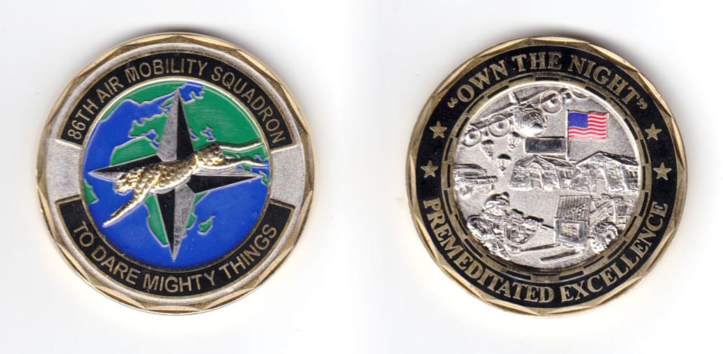 Round shaped coin, brass in color, 1 3/4 inches in diameter.