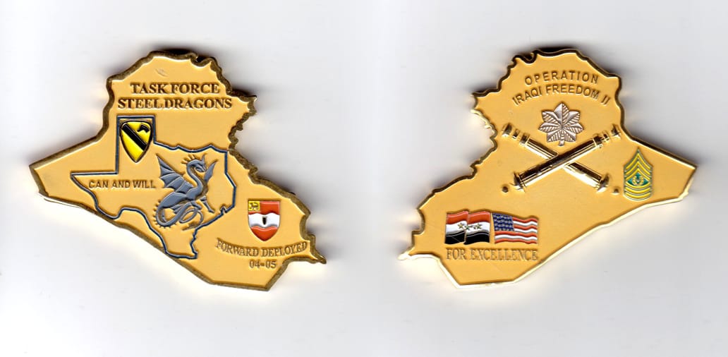 Iraq shaped coin, brass in color, 1 7/8th inches high x 2 3/4 inches wide.