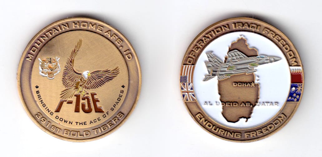 Round shaped coin, antique brass in color, 1 3/8 inches in diameter.