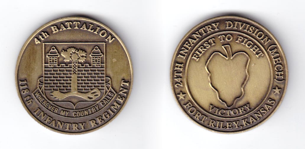 Round shaped coin, antique brass in color, 1 1/2 inches in diameter.