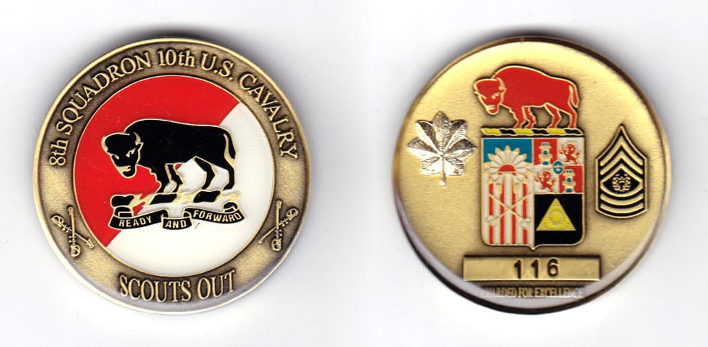 Round shaped coin, brass in color, 1 1/2 inches in diameter.