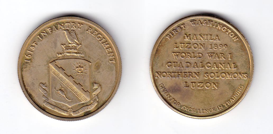 Round shaped coin, antique brass in color, 1 1/2 inches in diameter.