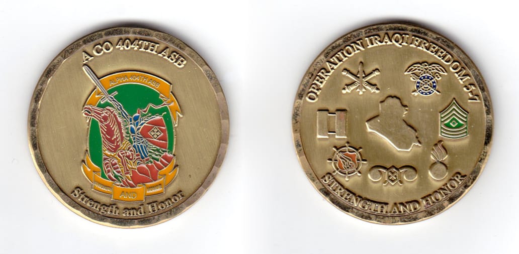 Round shaped coin, antique brass in color, 1 3/4 inches in diameter.