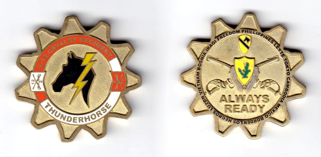 Cog shaped coin, brass in color, 2 inches in diameter.