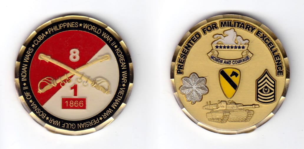 Round shaped coin, brass in color,2 inches in diameter.