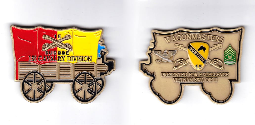 Covered wagon shaped coin, antique brass in color, 2 1/8 inches high x 3 inches wide.