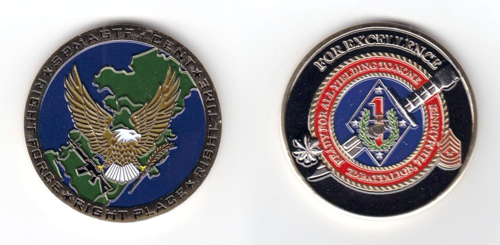 Round shaped coin, brass in color, 1 3/4 inches in diameter