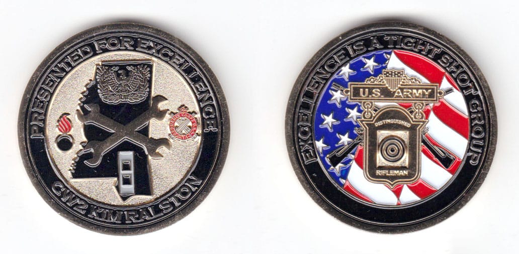 Round shaped coin, pewter in color, 1 3/4 inches in diameter.