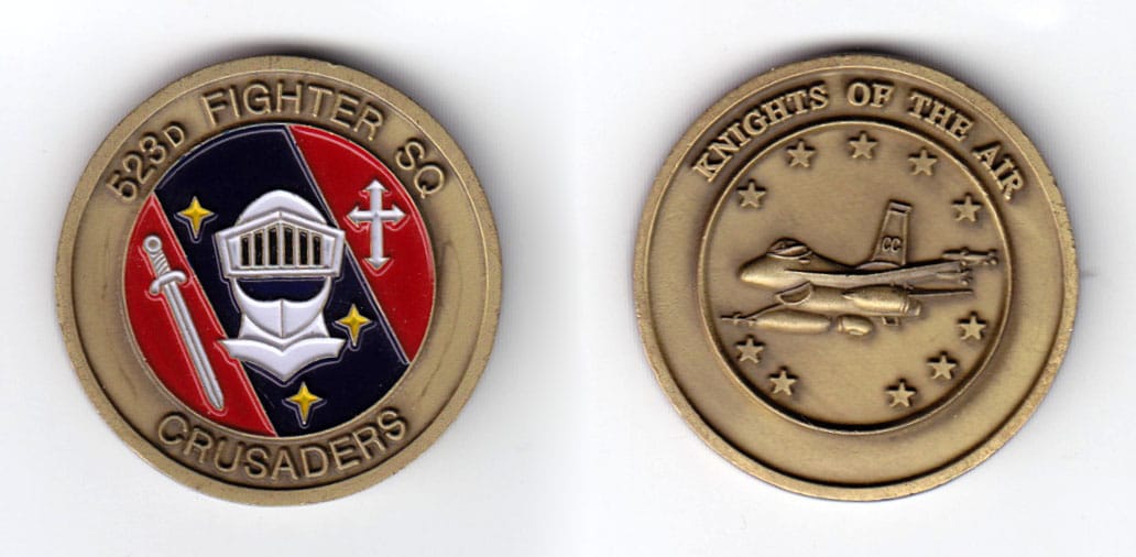 Round shaped coin, antique brass in color, 1 5/8 inches in diameter.